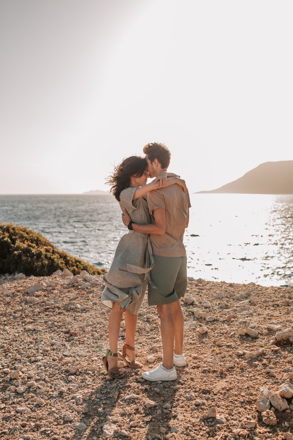 Romantic Couple Hugging By The Shore